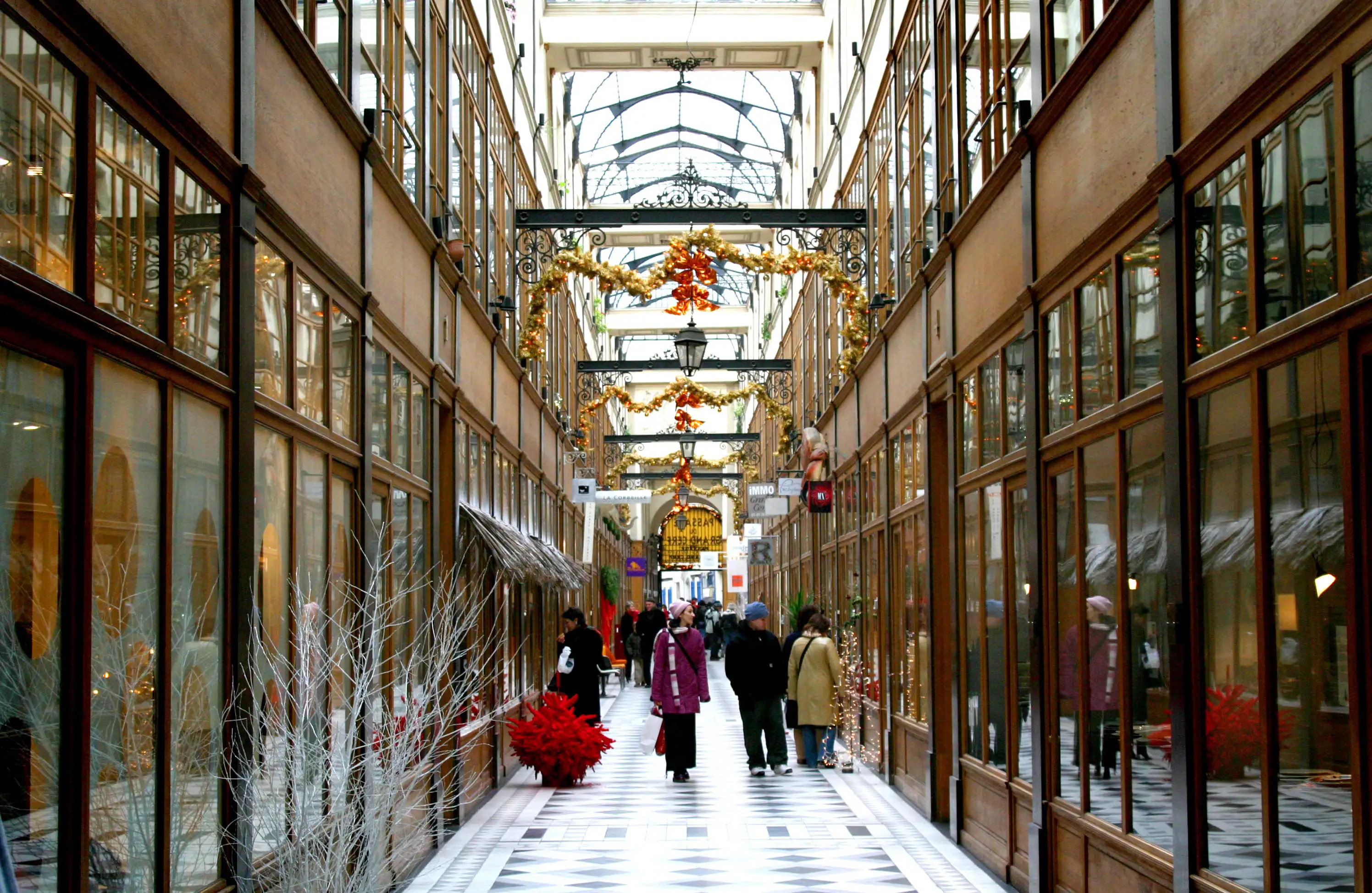 People shopping in an elegant galleried arcade