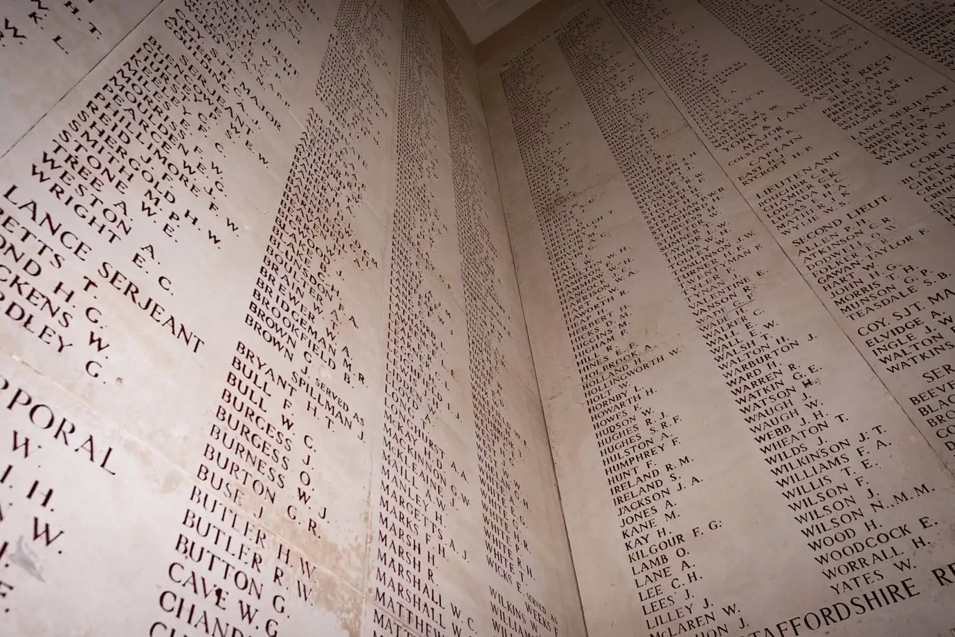 Long list of names enscribed on a war memorial