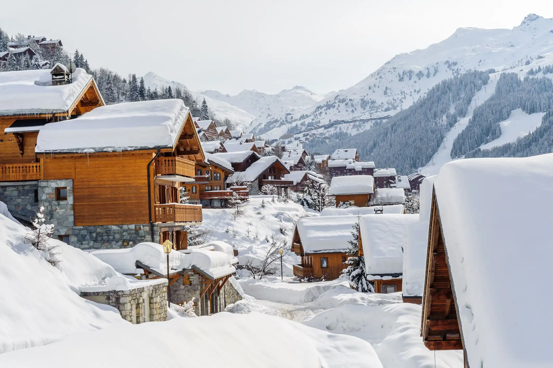 Snow-covered chalets in Méribel, France