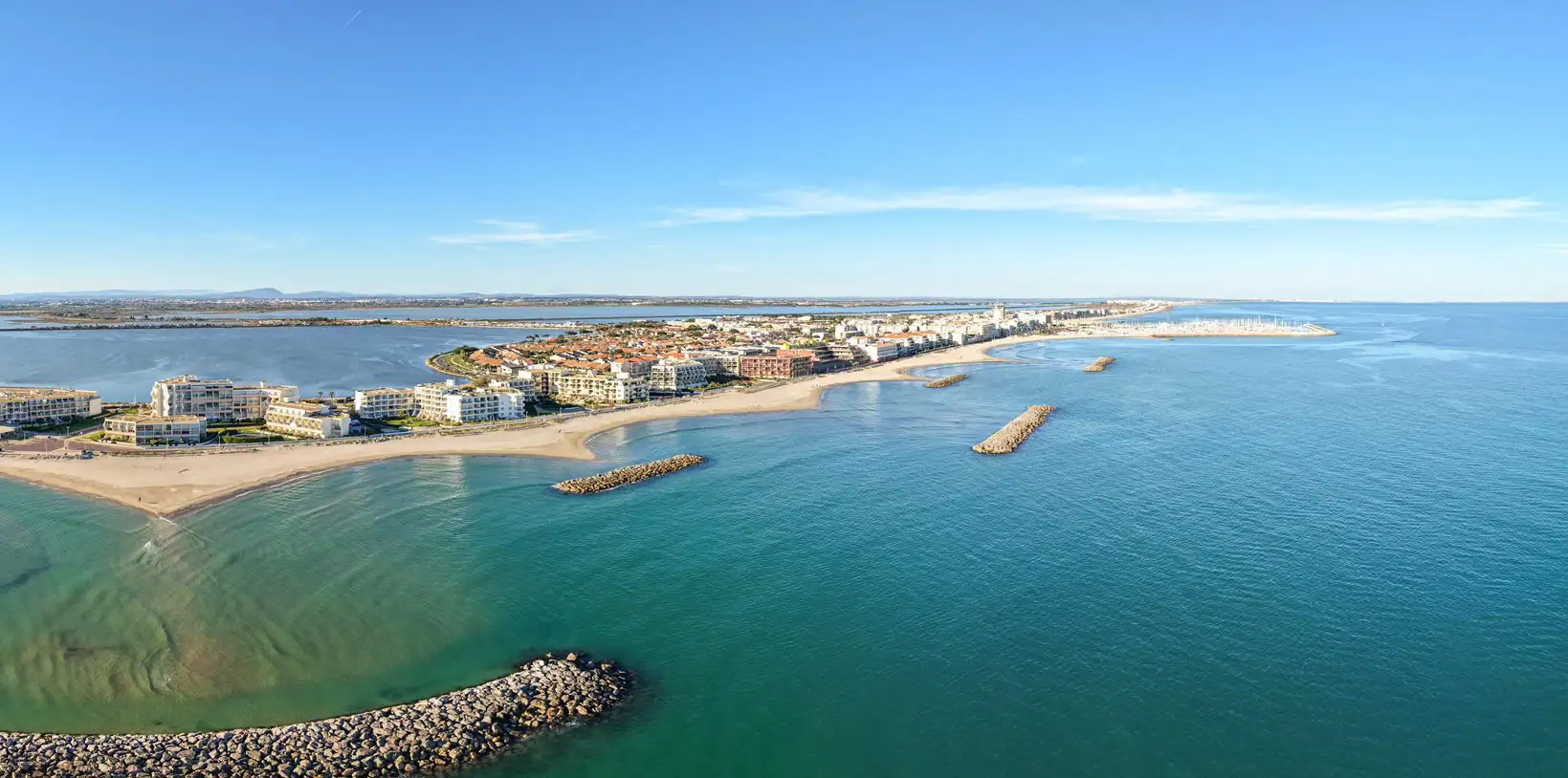 Long stretch of sandy beaches surrounded by sea