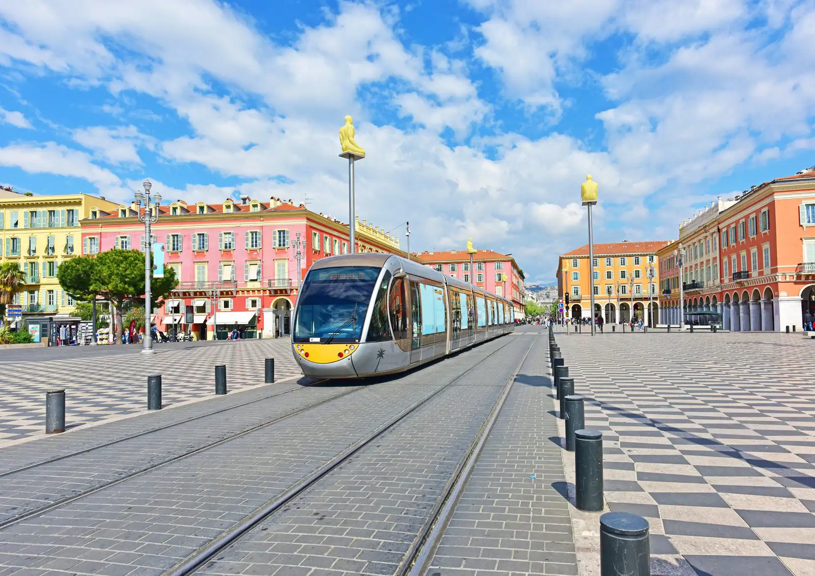 Tram pulling into city square in Nice, France