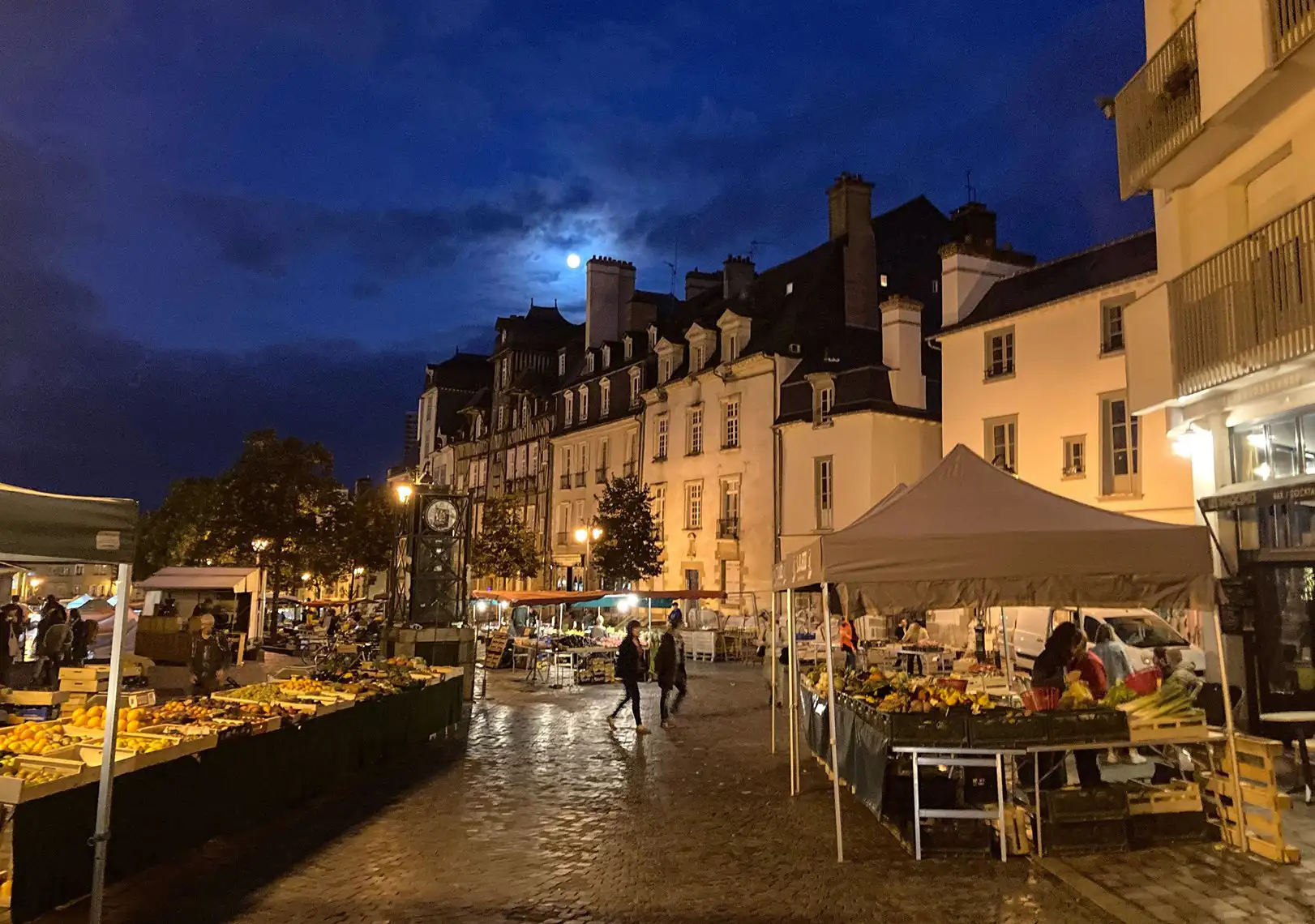 Market stalls being set up in early morning, Rennes, France