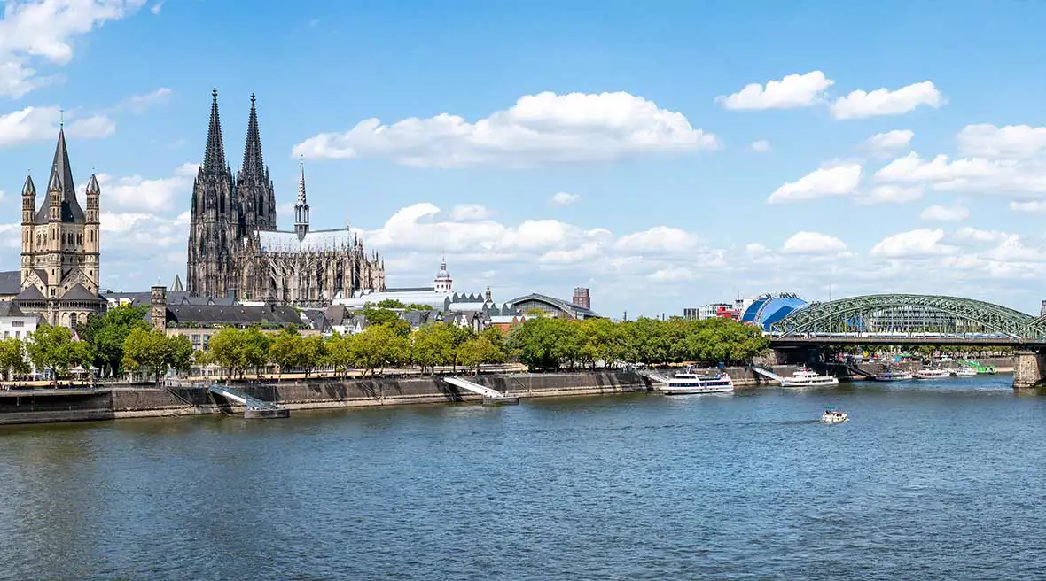 A cityscape view across the Rhine River.