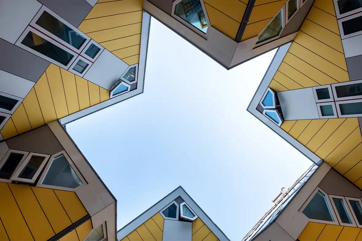 Worm’s eye view of abstract yellow buildings