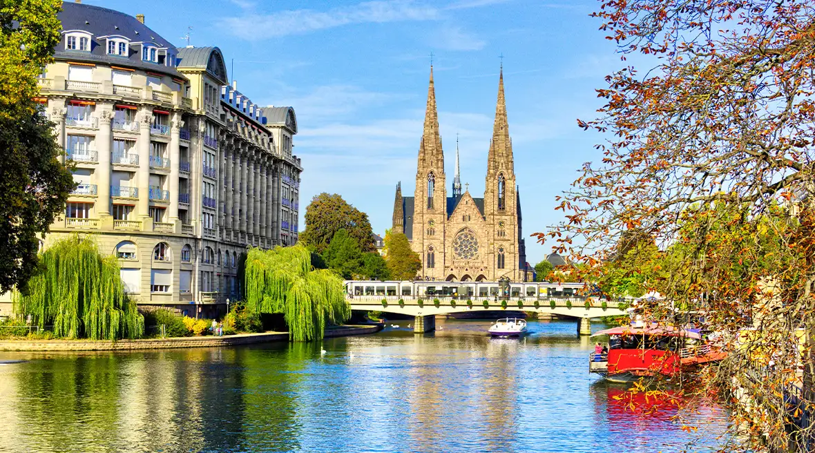 The city of Strasbourg, France, featuring the Cathédrale Notre-Dame de Strasbourg (Strasbourg Cathedral) on a sunny day
