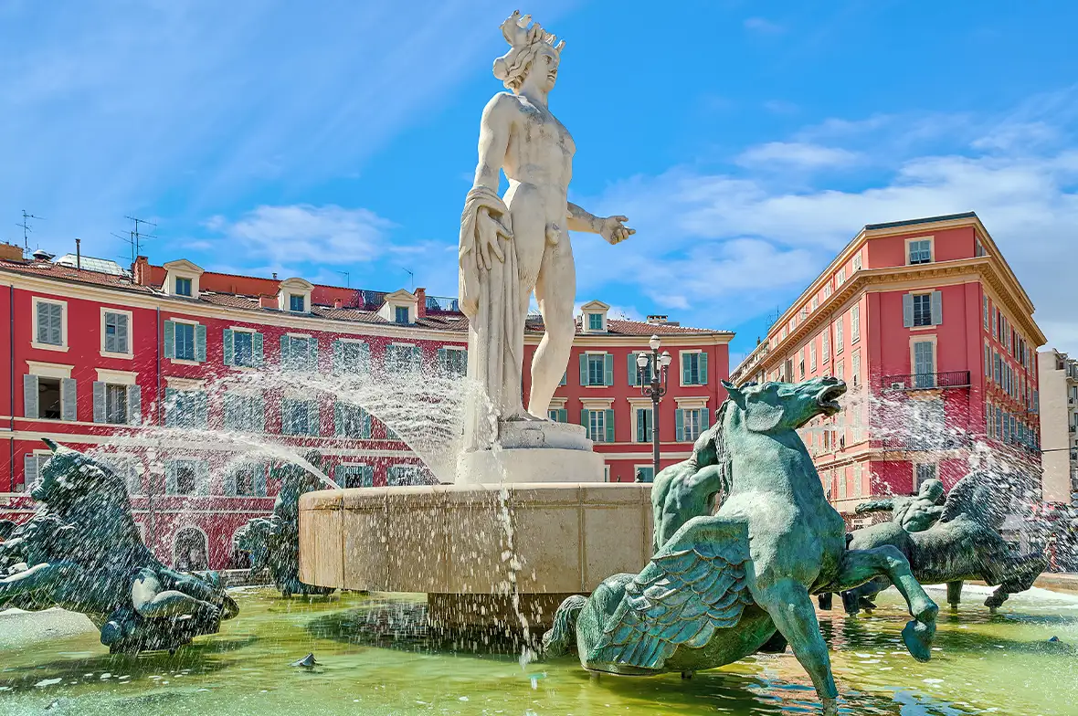fountain of water with winged horses and central figure from marble