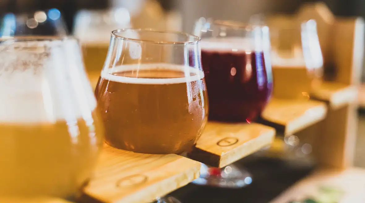 Glasses of craft beers in a tasting rack