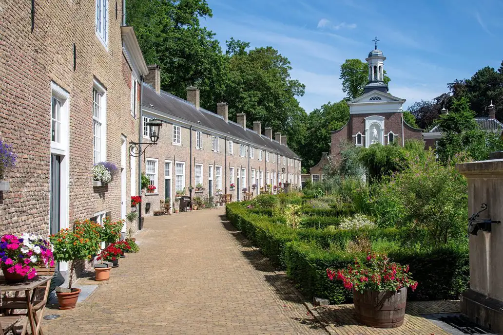 Cottages, gardens and a church on a summer’s day, Breda, Netherlands