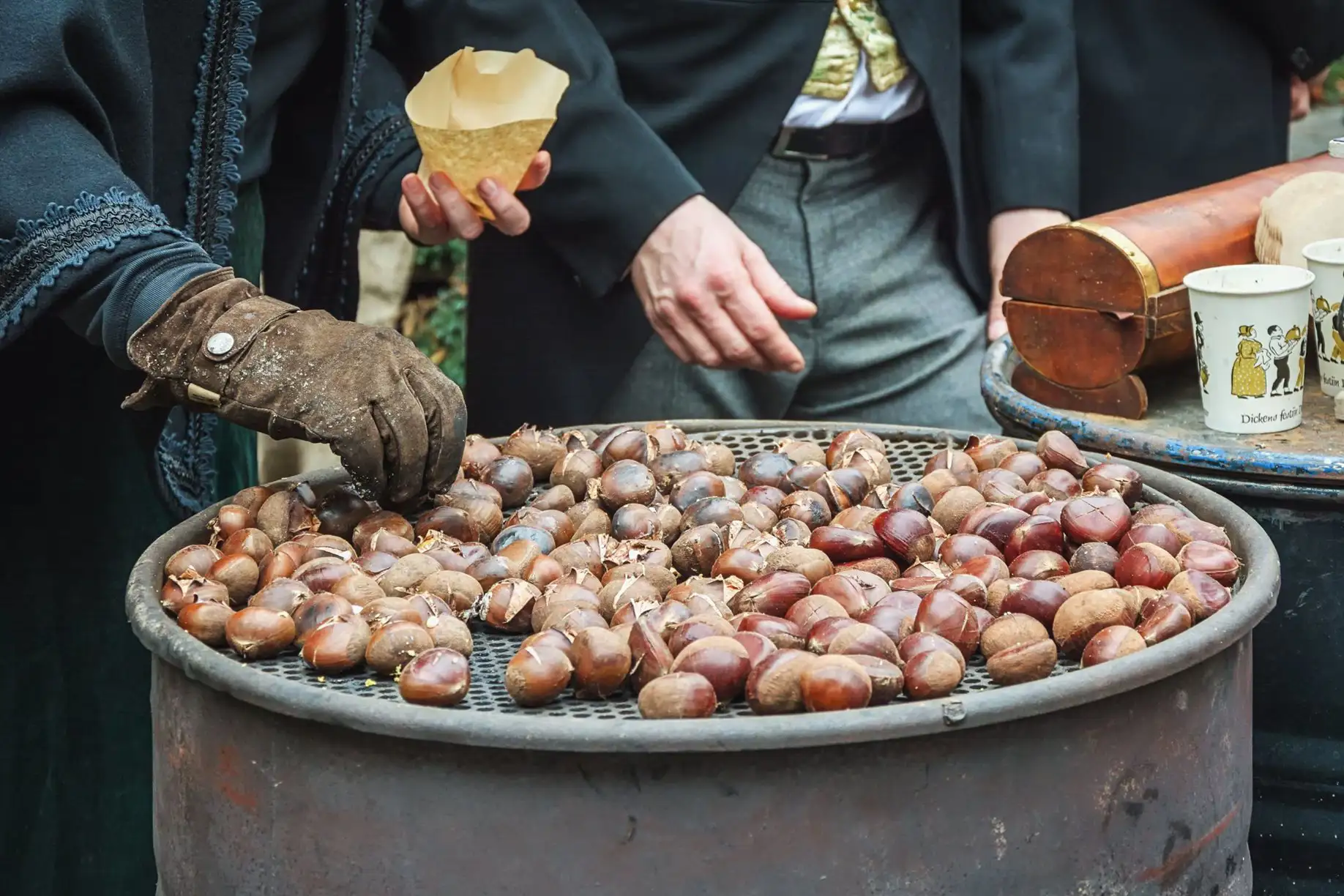 Chestnuts being roasted on a brazier