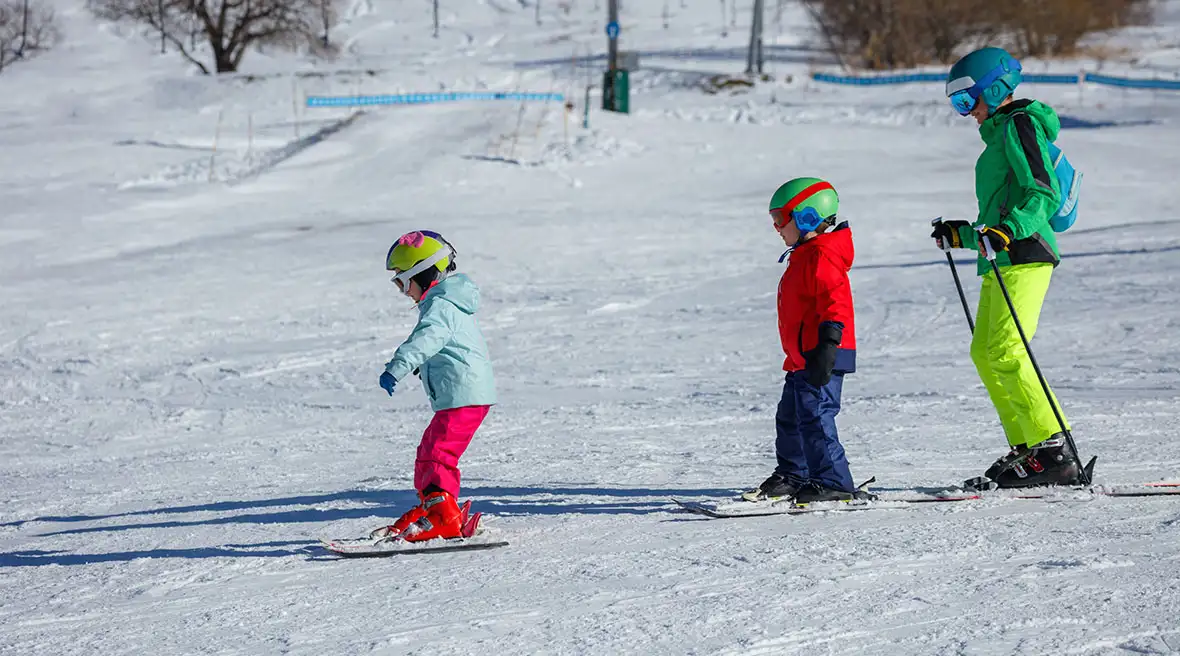Three children on the slopes
