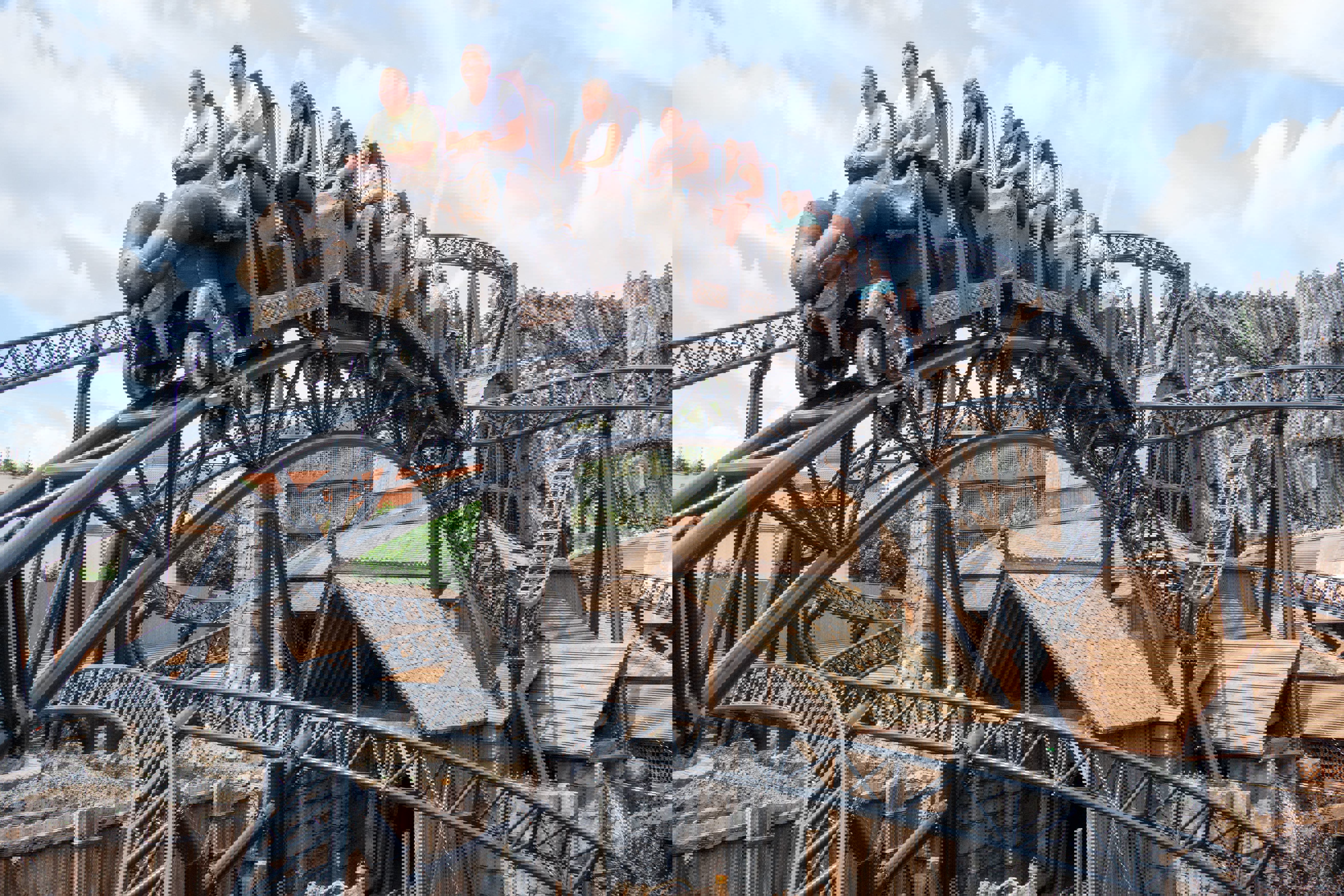 People on the Taron roller coaster, Phantasialand, Germany