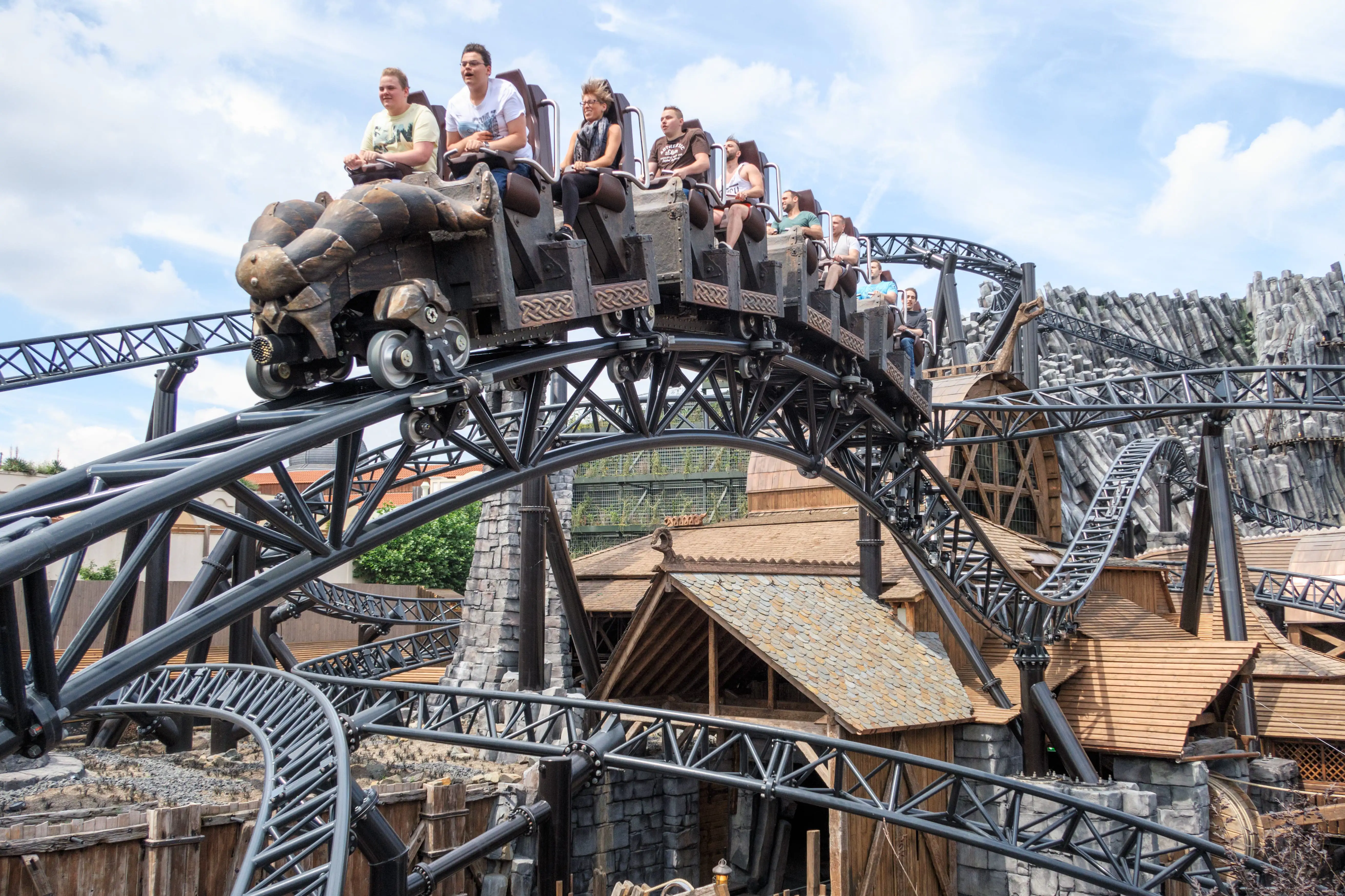 People on the Taron roller coaster, Phantasialand, Germany