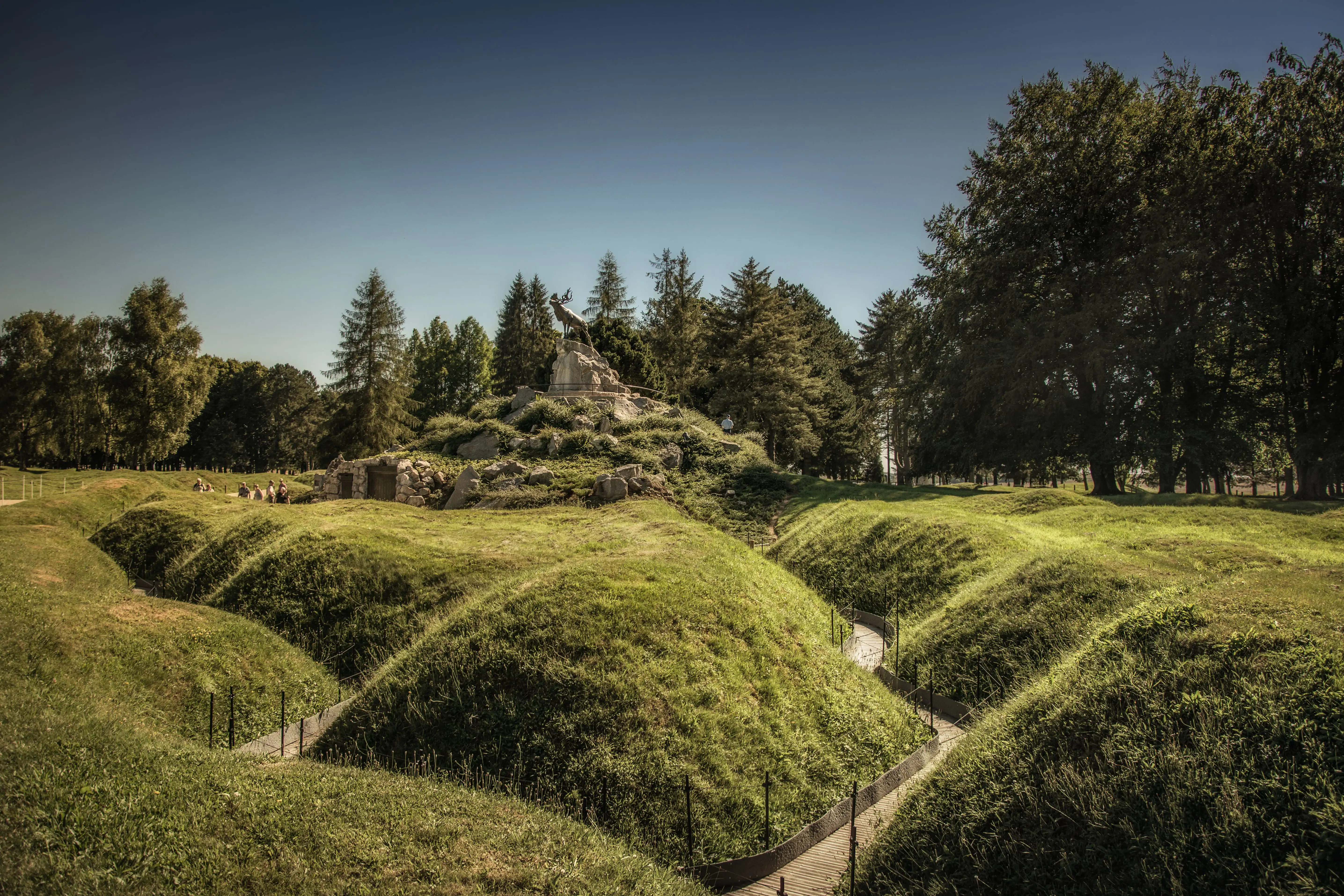 Grassy mounds with a path through them, former Somme trenches
