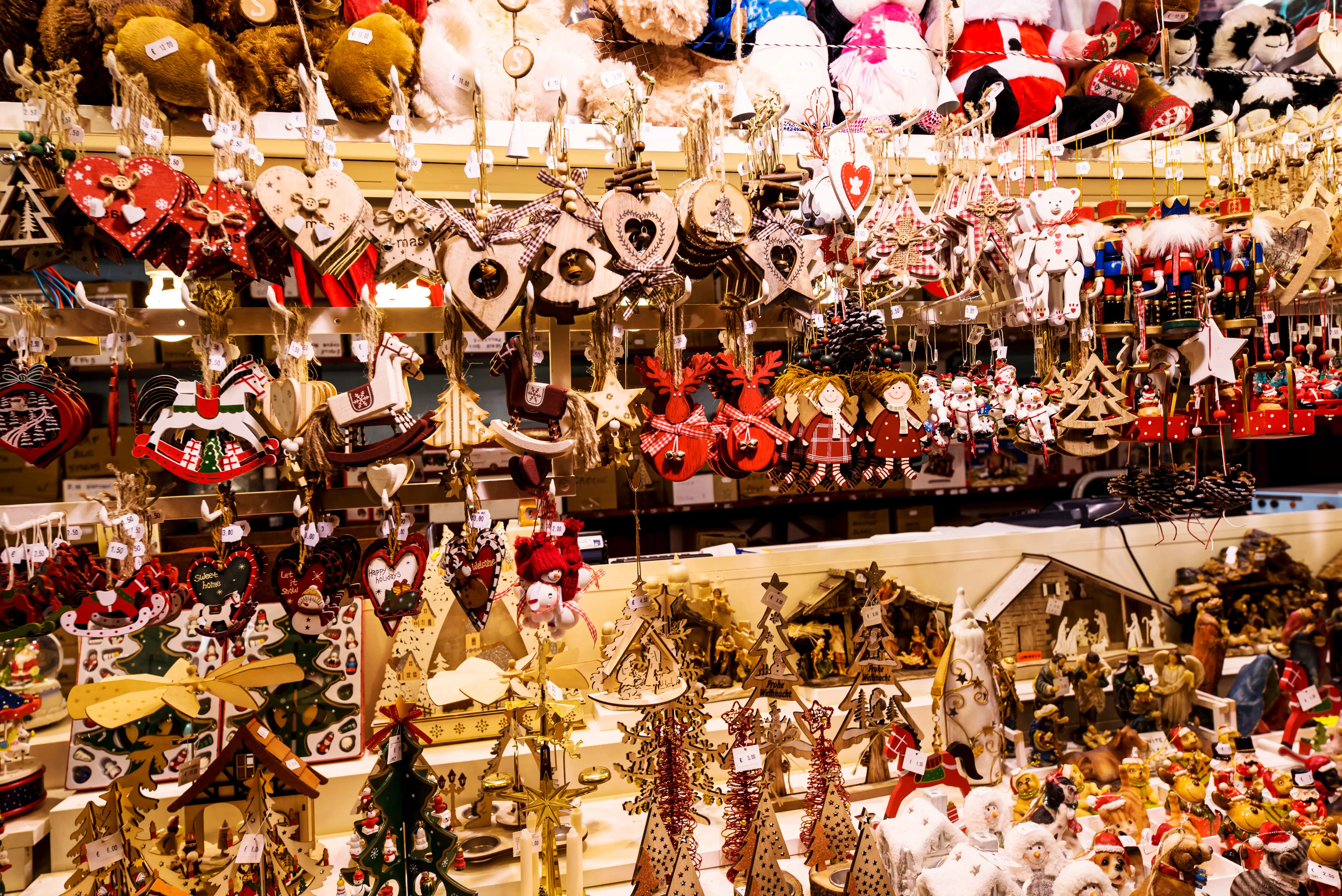 Handcrafted wooden Christmas decorations on display at Strasbourg’s festive market.