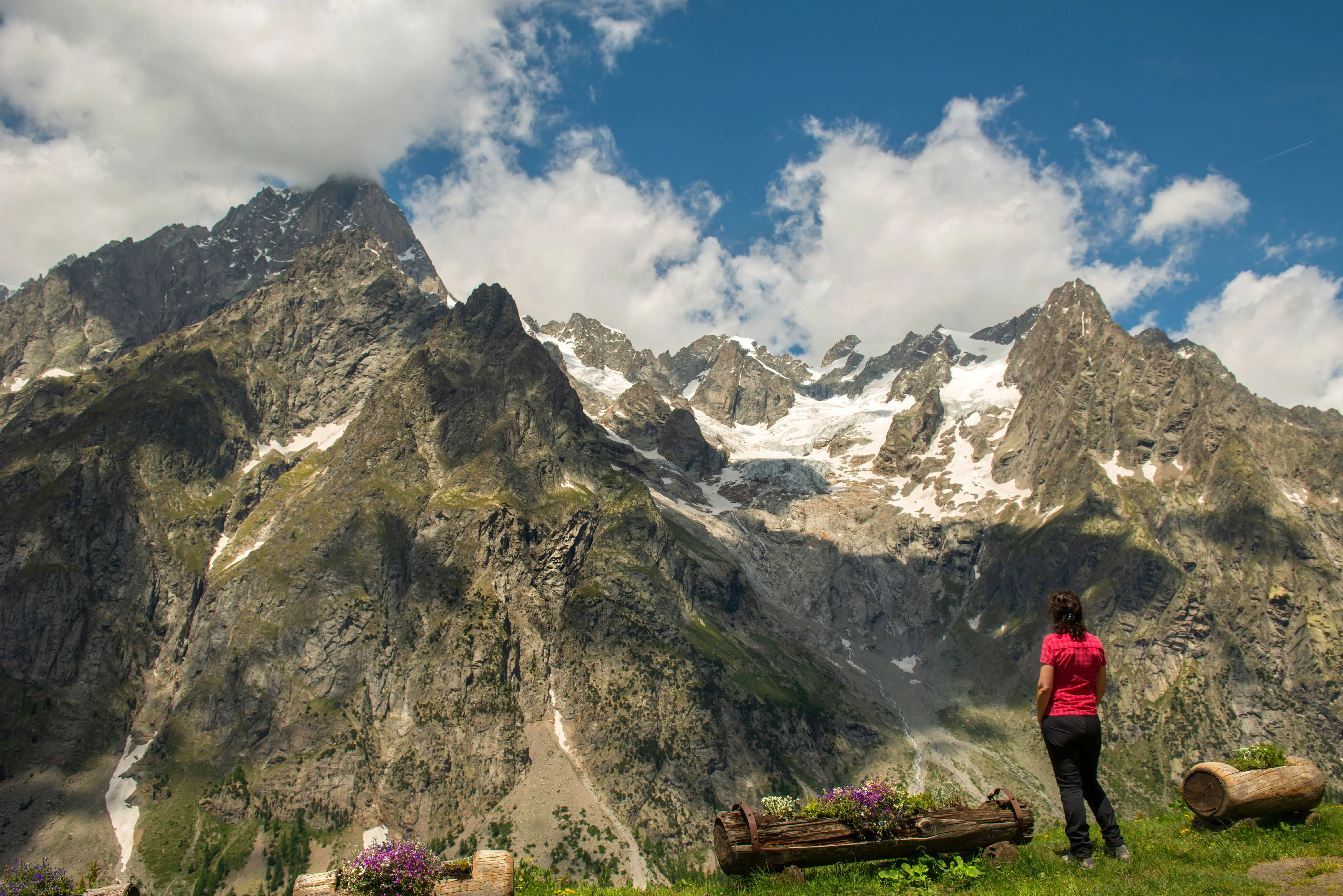 A woman looking at a view of mountains